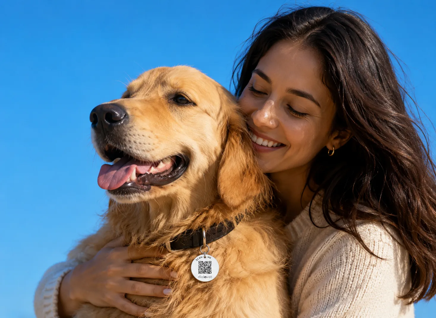 Woman hugging golden retriever with Dial A Vet QR tag